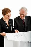 senior couple and house plans