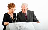 senior couple and house plans