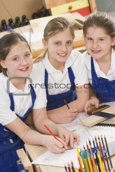 Schoolgirls in woodwork class