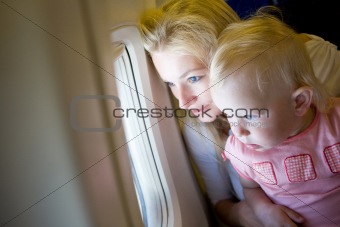 looking through the window of the plane