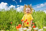 child in the field of poppies