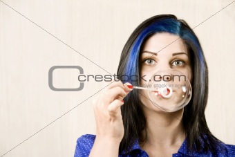 Pretty Woman Blowing a Bubble