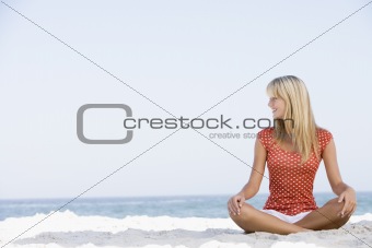 Young woman relaxing on beach