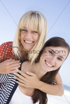 Two women on beach holiday