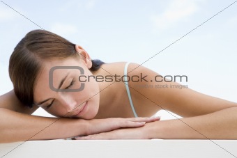 Young woman resting outside