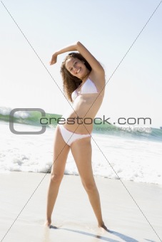 Young woman relaxing on beach