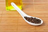 Peppercorns in the spoon