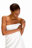 African-American girl wrapped in white bath towel