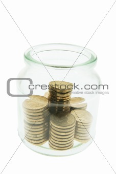 Stacks of Coins in Glass Jar