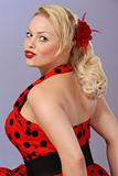 fifties burlesque blond in polka-dot dress 