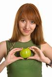 Sensual girl holding apple like a heart