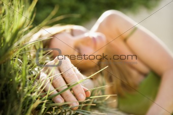 Woman in grass.