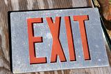 Exit sign on wood