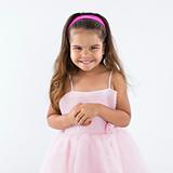 Little girl wearing pink dress.