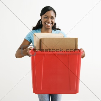 Woman recycling