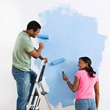 Couple painting together.