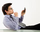 Man looking at cell phone.