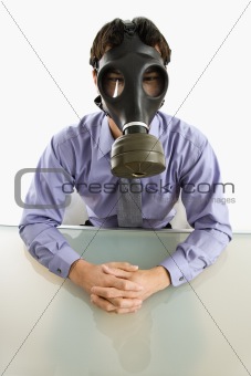 Man wearing gas mask.