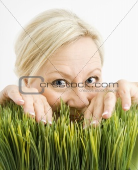 Mischievious woman in grass