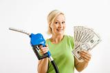 Happy woman with gas pump and money.