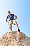 Hiker standing on a rock