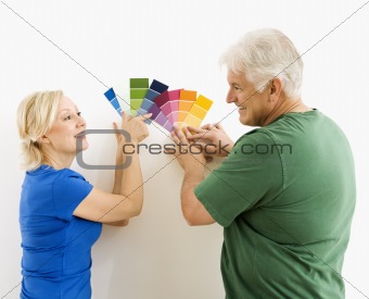 Man and woman looking at swatches.