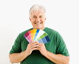 Man with paint swatches.