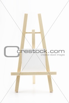 wooden easel with blank memo on white background