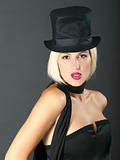 Blonde woman in black hat.