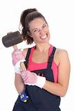 woman with black rubber mallet