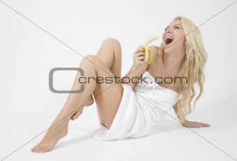 nice blonde woman holding banana
