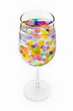 colored balls in a wine glass