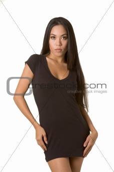 Young ethnic woman in tight brown dress