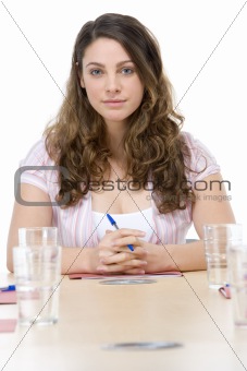 Businesswoman sitting in boardroom