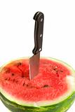 Half of juicy watermelon with knife