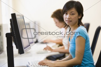 Two women in computer room
