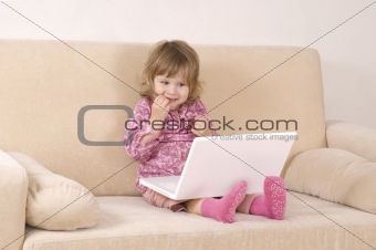 young girl using a laptop