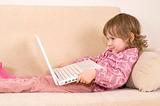 young girl using a laptop