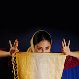 Indian woman peeking