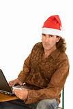 Christmas online laptop shopping middle-aged man