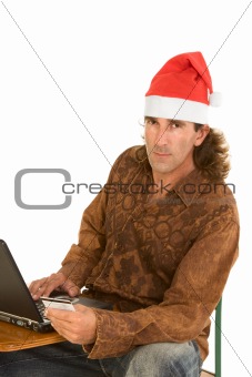 Christmas online laptop shopping middle-aged man