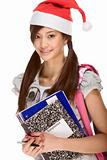 Asian student girl in Christmas Santa hat with composition book 