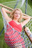 Woman sleeping in hammock