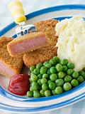 Breadcrumbed Luncheon Meat with Mashed Potato Peas and Tomato Ke