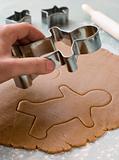 Cutting out a Gingerbread Man