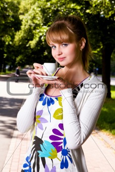 Beautiful young woman and coffee