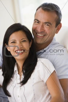 Couple in living room smiling