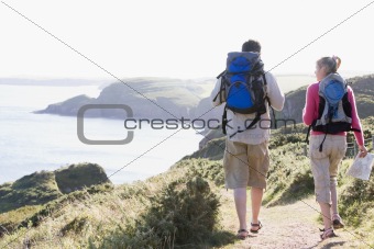 Couple on cliffside outdoors walking