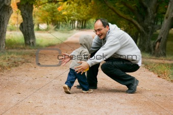 father and son in park