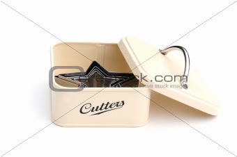 cookie cutters in a tin
